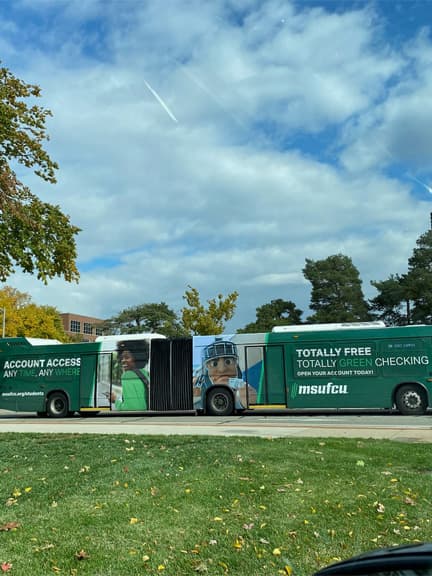 out of home advertising bus transit lansing msufcu