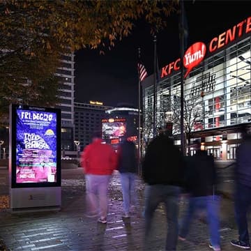 OUTFRONT Digital Kiosk Network in Downtown Louisville outside KFC Yum! Center out of home advertising street furniture
