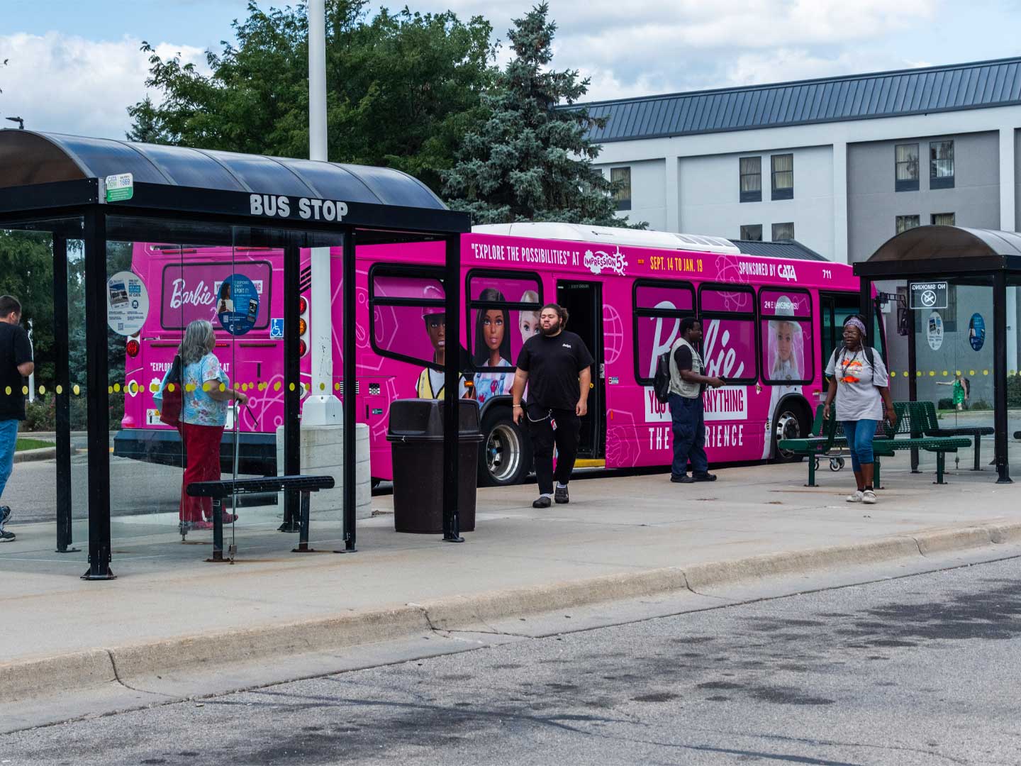 out of home advertising flint bus wrap king barbie