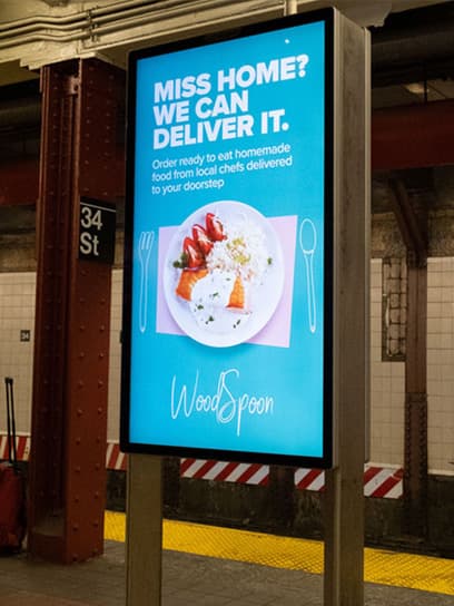 out of home advertising woodspoon digital liveboard subway