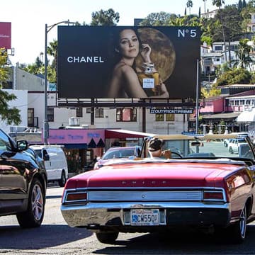 Chanel advertisement on OUTFRONT PRIME billboard on Sunset Strip in West Hollywood out of home advertising